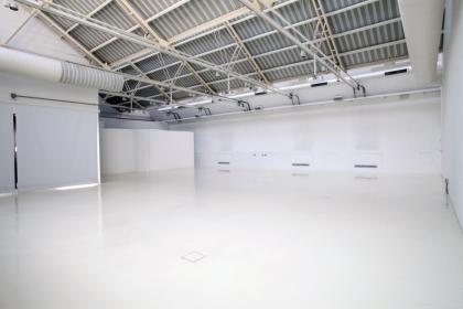 White-washed, multipurpose space in Bicocca, Milan