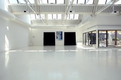 White-washed, multipurpose space in Bicocca, Milan