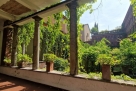 Cloister with a garden in central Milan