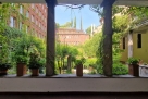 Cloister with a garden in central Milan