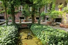 Cloister with a garden in central Milan