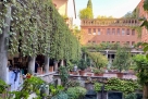 Cloister with a garden in central Milan