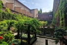 Cloister with a garden in central Milan